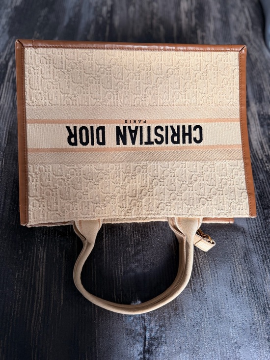 Dior Handbags - Dior Cream Canvas Book Tote with Tan Trim and Black Logo